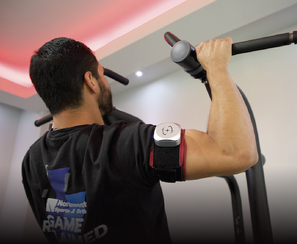 A patient doing pull ups