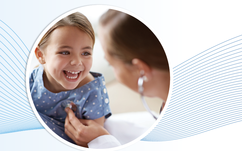 A young girl being treated by a doctor