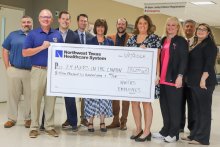 Ryan Parnell and members of the Northwest Texas Healthcare System senior leadership team